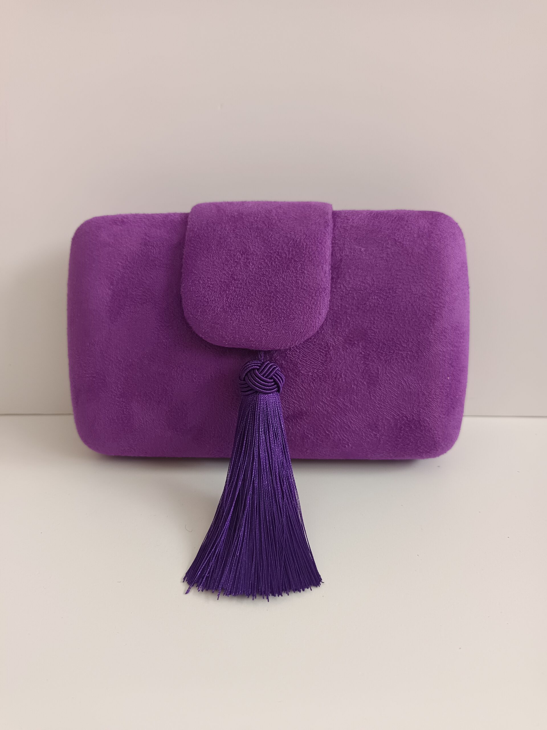 cartera morada borlon